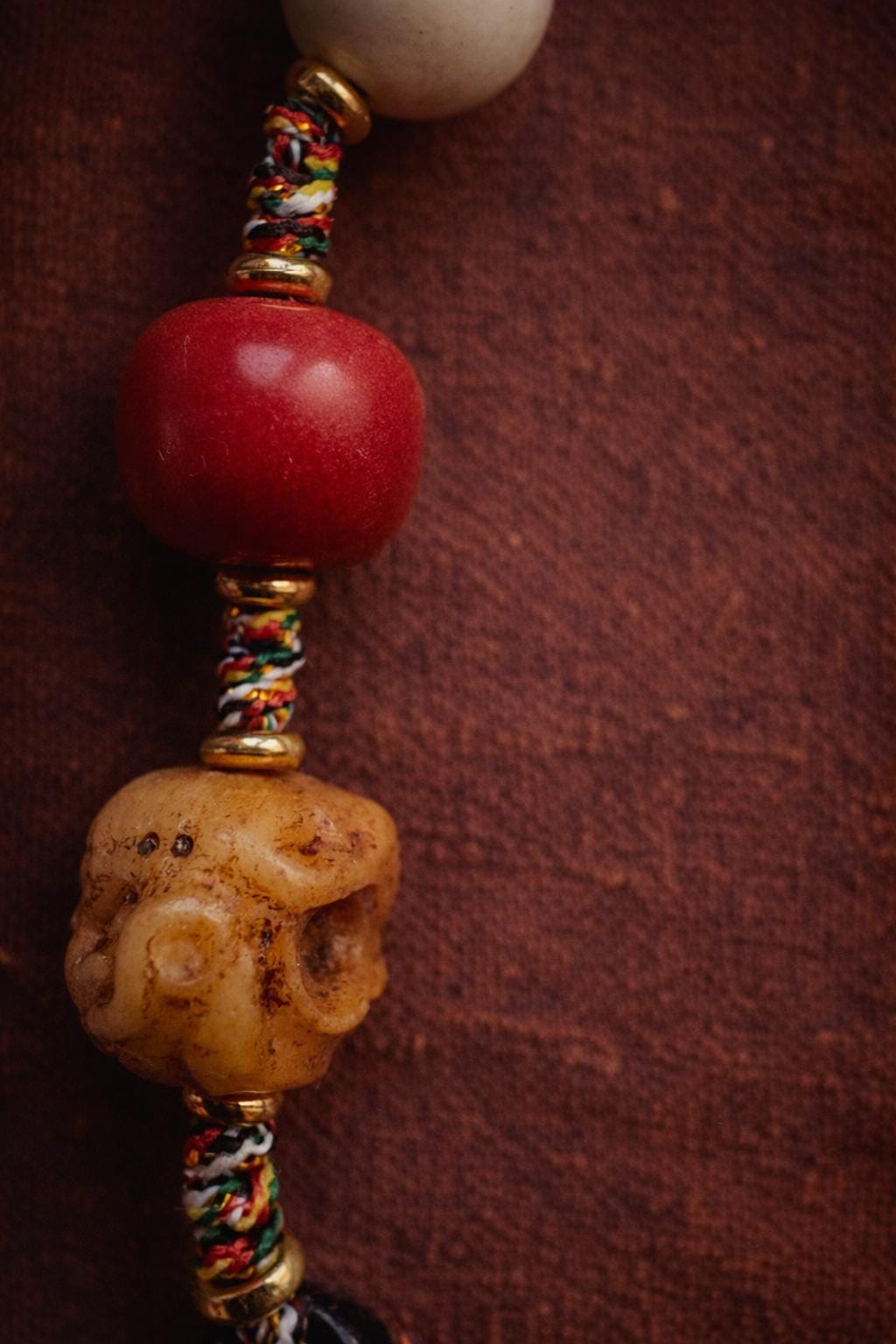 Tibetan Seven-Eye Dzi Agate Pendant Necklace, Braided Cord, Yak Bone Beads