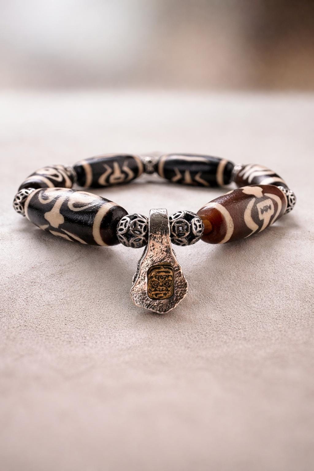 Tibetan Dzi Bead Bracelet – Tibetan Style with Silver Spacer Beads